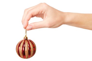 Bir Noel top tutan kadının el