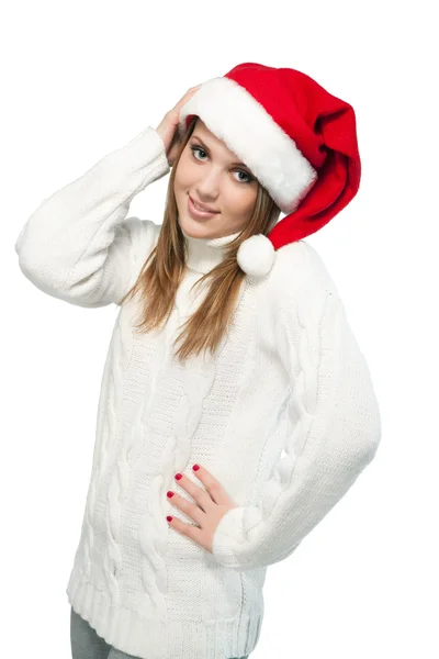 Schöne Frau mit Weihnachtsmütze lächelnd — Stockfoto