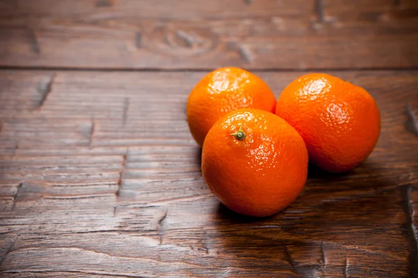 Tangerines on wooden table — Stock Photo, Image