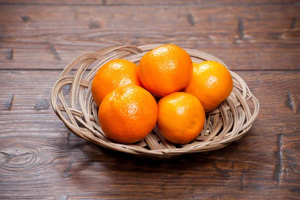 Tangerines on wooden table — Stock Photo, Image