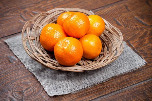 Tangerines on wooden table — Stock Photo, Image
