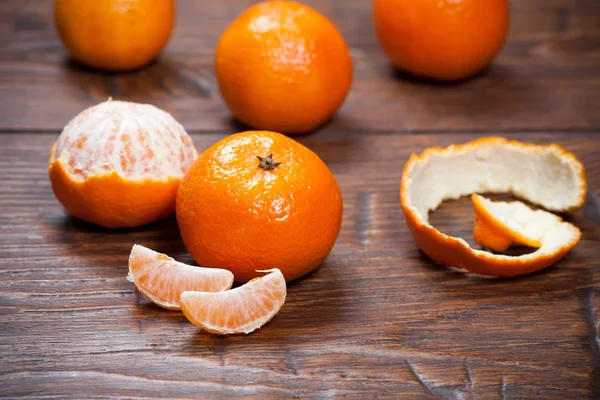 Tangerines on wooden table — Stock Photo, Image