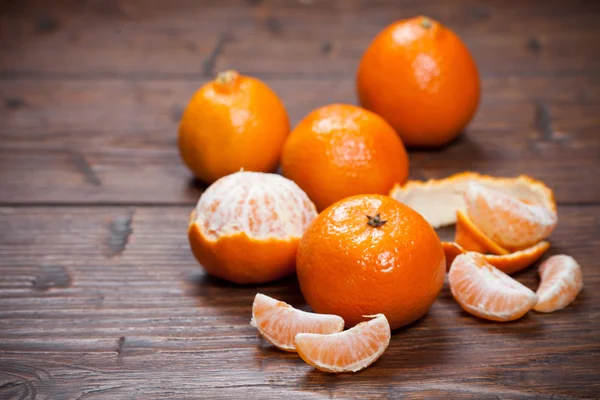 Tangerines on wooden table — Stock Photo, Image