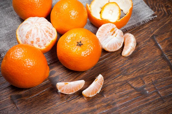 Tangerines on wooden table — Stock Photo, Image