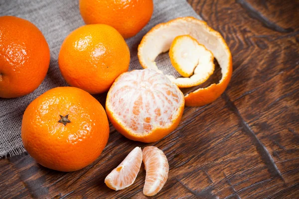 Tangerines on wooden table — Stock Photo, Image