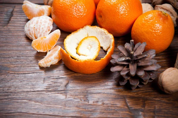 Tangerines on wooden table — Stock Photo, Image