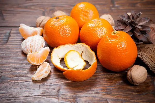 Tangerines on wooden table — Stock Photo, Image