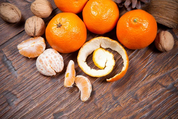 Tangerines on wooden table — Stock Photo, Image