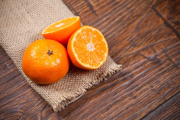 Tangerines on wooden table — Stock Photo, Image