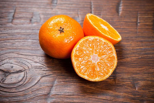 Tangerines on wooden table — Stock Photo, Image