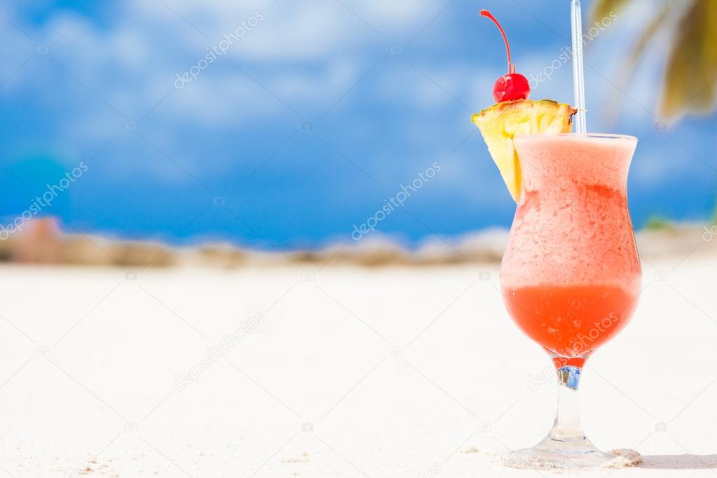 picture of fresh fruit cocktail on tropical beach