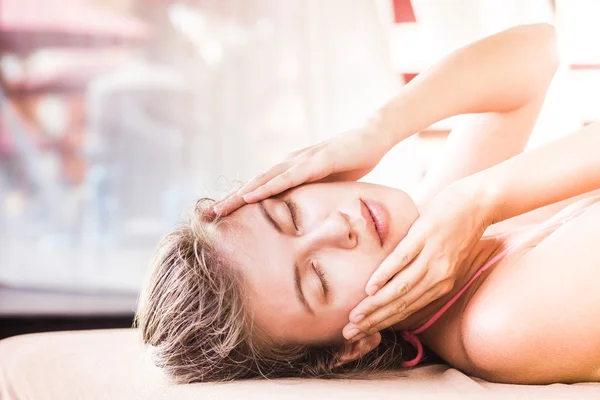 Beautiful young woman enjoying her time in tropical spa — Stock Photo, Image