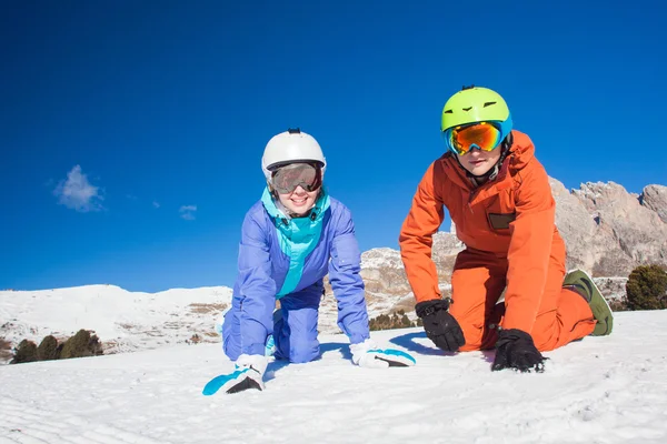 Picture of two snowboarders having fun on the top of Dolomiti Alps — Stock Photo, Image