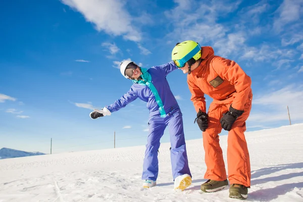Picture of two snowboarders having fun on the top of Dolomiti Alps — Stock Photo, Image