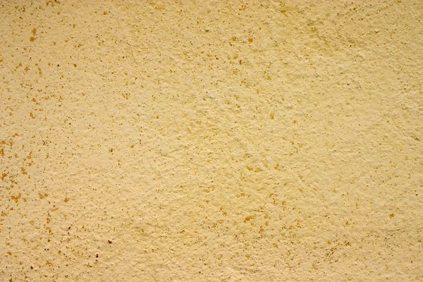 Pintura amarela velha em uma superfície plana — Fotografia de Stock