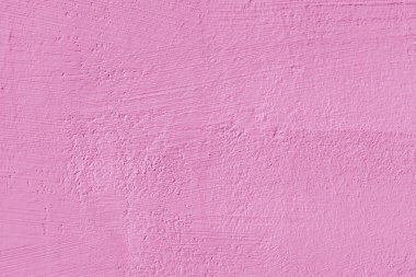 Pembe alçı dokusu. Modern bir çatı katının içinde. Soyut kaba bir arkaplan. Eski bir evin cephesi.