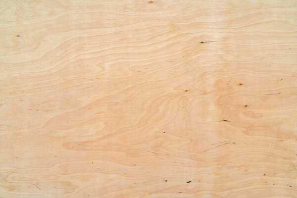 Light plywood texture. Patterned wooden background. Wood product.