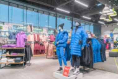 Arka plan için mağazadaki alışveriş merkezinin bulanıklığı