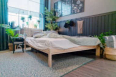 Modern yatak odasının arka planı bulanık..