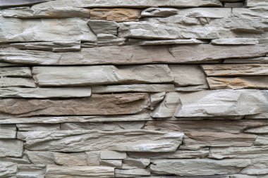 Beyaz taştan bir bina duvarı. Modern bir çatı katının içinde. Soyut arkaplan tasarımı. 