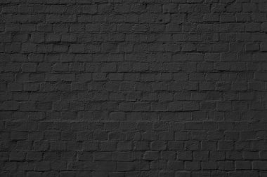 Siyah tuğla bina duvarı. Modern bir çatı katının içinde. Tasarım için arkaplan