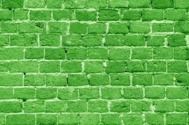 Yeşil tuğla bina duvarı. Modern bir çatı katının içinde. Tasarım için arkaplan