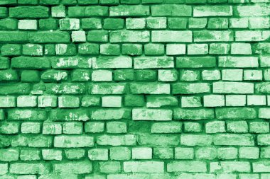 Yeşil tuğla bina duvarı. Modern bir çatı katının içinde. Tasarım için arkaplan