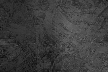 Siyah alçı dokusu. Binanın pürüzlü duvarı. 