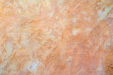 Bej alçı dokusu. Binanın pürüzlü duvarı. 