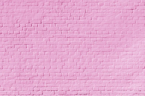Pink brick wall texture. Building architectural background.
