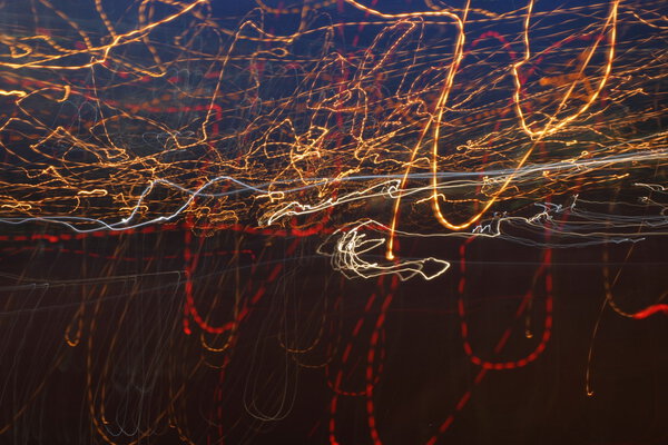 Smear headlights of cars traveling