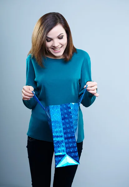 Smiling girl in a blue t-shirt — Stock Photo, Image