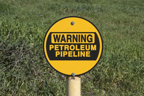 Warnschild für Erdölpipeline — Stockfoto