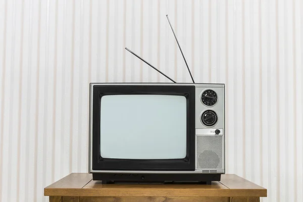 Old Television with Antenna on Wood Table. — Stock Photo, Image