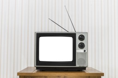 Beyaz ahşap masa üzerinde eski televizyon ekranı kesmek