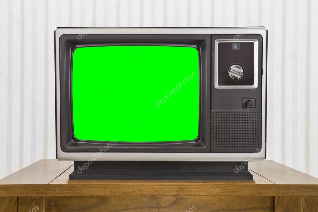 Analogue Portable Television on Table with Green Screen