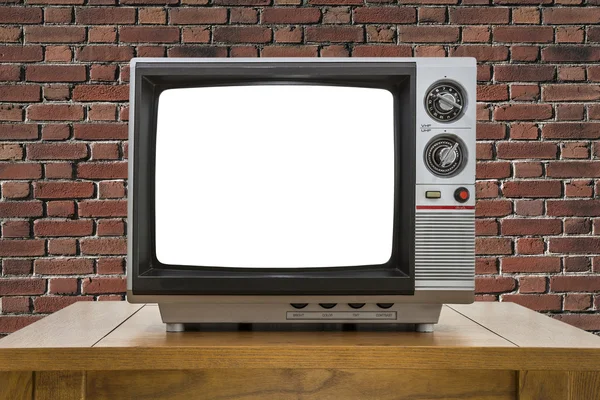 Vintage-Kofferfernseher mit roter Ziegelwand und ausgeschnittenem Bildschirm — Stockfoto