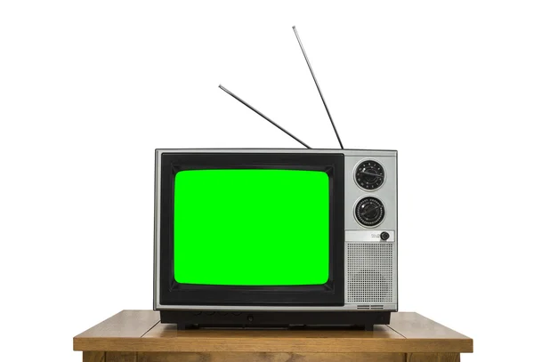 Ahşap masa üzerinde beyaz renk ekran ile izole Vintage televizyonda — Stok fotoğraf
