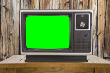 Eski televizyon chroma anahtar yeşil ekran ve rustik ahşap duvar