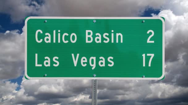 Las Vegas Highway Sign with Time Lapse Clouds — Stock Video