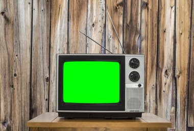 Vintage televizyon eski ahşap duvar ve renk ekran