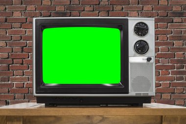 Tuğla duvar ve chroma anahtar yeşil ekran ile analog televizyon
