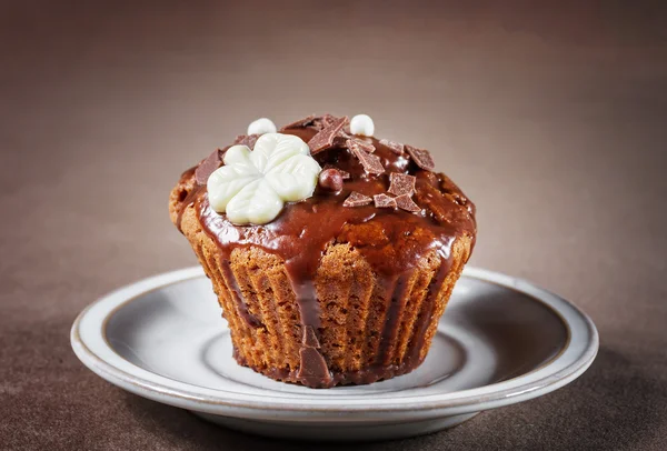 Chocolate muffin on a dark background — Stock Photo, Image