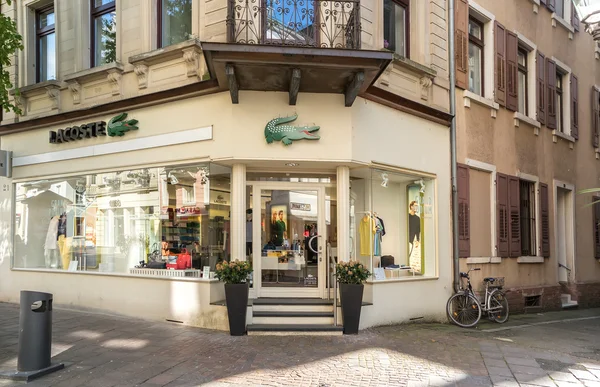 BADEN-BADEN, GERMANY  - MAY 4: Lacoste outlet. Lacoste is a Fren — Stock Photo, Image