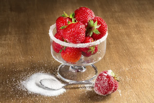 Ripe strawberry in sugar closeup — Stock Photo, Image