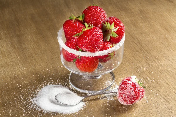 Ripe strawberry in sugar closeup — Stock Photo, Image