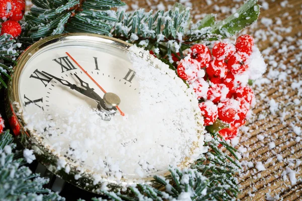 Christmas clock with winter decoration — Stock Photo, Image