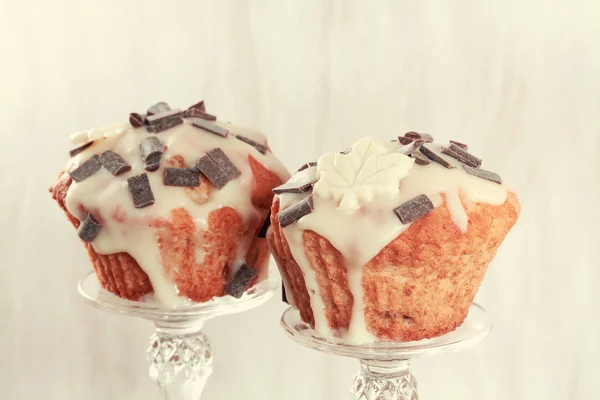 Leckere Muffins mit Schokoladendekoration. Getöntes Image. — Stockfoto