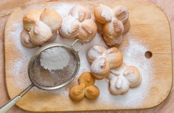 Shortbread cookies covered with powered sugar — Stock Photo, Image