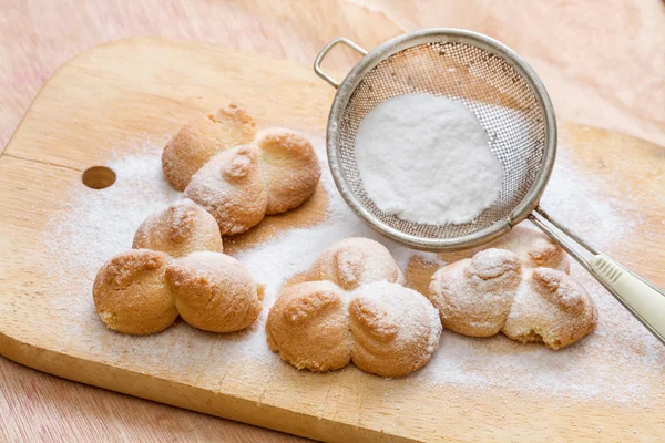 Shortbread cookies covered with powered sugar — Stock Photo, Image